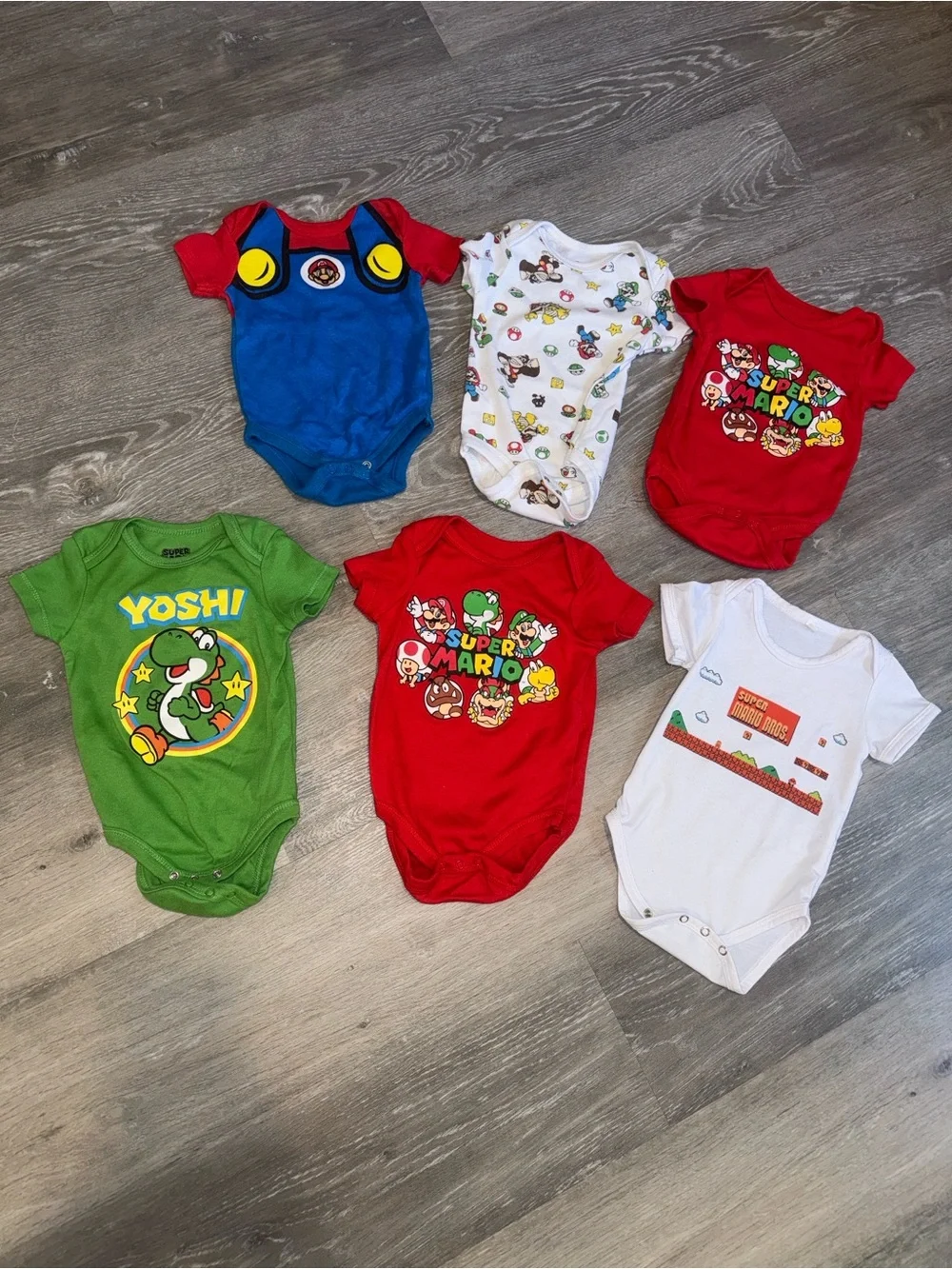 Super Mario baby onesies